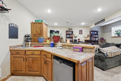 Welcome to 702 Copper Oaks Drive, a stunning 4-bedroom, 3-bath on Briarbrook Golf Course in Missouri - for sale on GolfHomes.com, golf home, golf lot