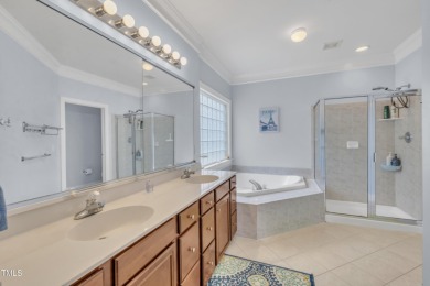 This stately, brick front home in popular Brier Creek golf on Brier Creek Country Club in North Carolina - for sale on GolfHomes.com, golf home, golf lot