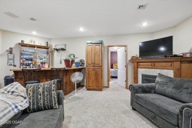 Welcome to 702 Copper Oaks Drive, a stunning 4-bedroom, 3-bath on Briarbrook Golf Course in Missouri - for sale on GolfHomes.com, golf home, golf lot