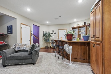 Welcome to 702 Copper Oaks Drive, a stunning 4-bedroom, 3-bath on Briarbrook Golf Course in Missouri - for sale on GolfHomes.com, golf home, golf lot