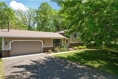This home is a serene haven that perfectly balances modern on Hidden Haven Golf Club in Minnesota - for sale on GolfHomes.com, golf home, golf lot