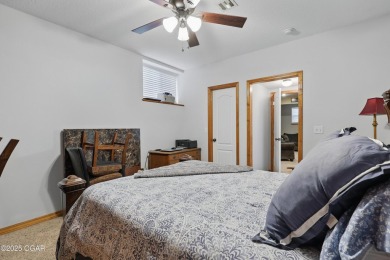 Welcome to 702 Copper Oaks Drive, a stunning 4-bedroom, 3-bath on Briarbrook Golf Course in Missouri - for sale on GolfHomes.com, golf home, golf lot