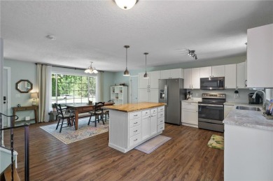 This home is a serene haven that perfectly balances modern on Hidden Haven Golf Club in Minnesota - for sale on GolfHomes.com, golf home, golf lot