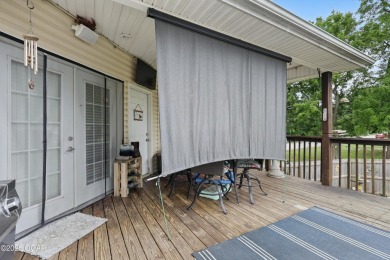 Welcome to 702 Copper Oaks Drive, a stunning 4-bedroom, 3-bath on Briarbrook Golf Course in Missouri - for sale on GolfHomes.com, golf home, golf lot