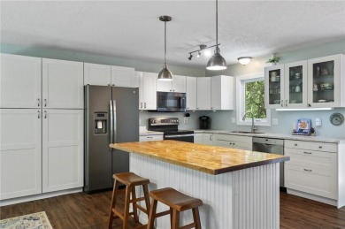 This home is a serene haven that perfectly balances modern on Hidden Haven Golf Club in Minnesota - for sale on GolfHomes.com, golf home, golf lot