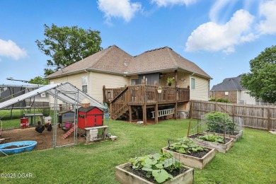Welcome to 702 Copper Oaks Drive, a stunning 4-bedroom, 3-bath on Briarbrook Golf Course in Missouri - for sale on GolfHomes.com, golf home, golf lot