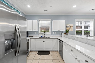 This beautiful three bedroom two bathroom furnished end unit is on Barefoot Resort and Golf Club  in South Carolina - for sale on GolfHomes.com, golf home, golf lot