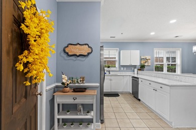 This beautiful three bedroom two bathroom furnished end unit is on Barefoot Resort and Golf Club  in South Carolina - for sale on GolfHomes.com, golf home, golf lot