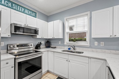 This beautiful three bedroom two bathroom furnished end unit is on Barefoot Resort and Golf Club  in South Carolina - for sale on GolfHomes.com, golf home, golf lot