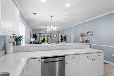 This beautiful three bedroom two bathroom furnished end unit is on Barefoot Resort and Golf Club  in South Carolina - for sale on GolfHomes.com, golf home, golf lot