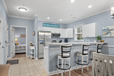 This beautiful three bedroom two bathroom furnished end unit is on Barefoot Resort and Golf Club  in South Carolina - for sale on GolfHomes.com, golf home, golf lot