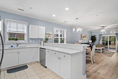 This beautiful three bedroom two bathroom furnished end unit is on Barefoot Resort and Golf Club  in South Carolina - for sale on GolfHomes.com, golf home, golf lot