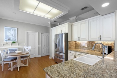Welcome to this beautifully updated St. Regis model home in the on Kings Ridge Golf Club in Florida - for sale on GolfHomes.com, golf home, golf lot
