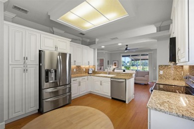 Welcome to this beautifully updated St. Regis model home in the on Kings Ridge Golf Club in Florida - for sale on GolfHomes.com, golf home, golf lot