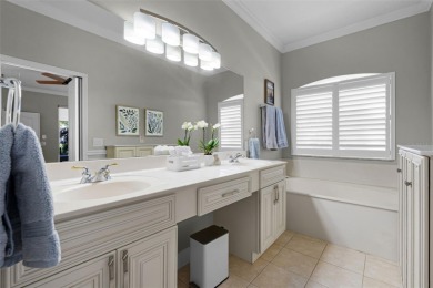 Welcome to this beautifully updated St. Regis model home in the on Kings Ridge Golf Club in Florida - for sale on GolfHomes.com, golf home, golf lot