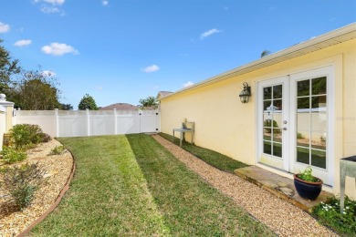 Courtyard Villa with a STRETCHED 2-CAR GARAGE offered TURN-KEY on The Links of Spruce Creek in Florida - for sale on GolfHomes.com, golf home, golf lot