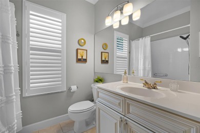 Welcome to this beautifully updated St. Regis model home in the on Kings Ridge Golf Club in Florida - for sale on GolfHomes.com, golf home, golf lot