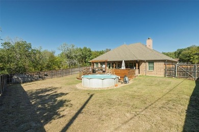 Welcome to this beautifully maintained 3-bedroom, 2-bath home on on The Club At Runaway Bay in Texas - for sale on GolfHomes.com, golf home, golf lot