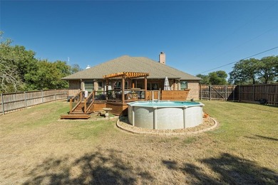 Welcome to this beautifully maintained 3-bedroom, 2-bath home on on The Club At Runaway Bay in Texas - for sale on GolfHomes.com, golf home, golf lot