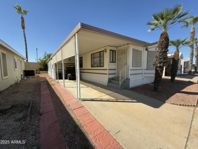 Rare chance to own both the home and land in one of the Valley's on Pueblo Golf Course in Arizona - for sale on GolfHomes.com, golf home, golf lot