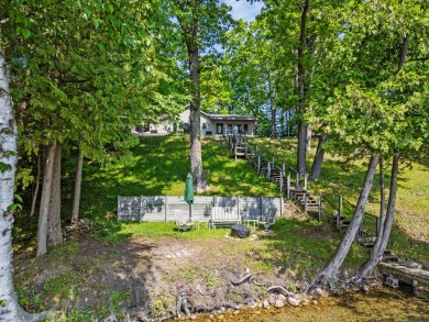 This beautiful Lake Mecosta property features 137 feet of nice on St. Ives Golf Club in Michigan - for sale on GolfHomes.com, golf home, golf lot