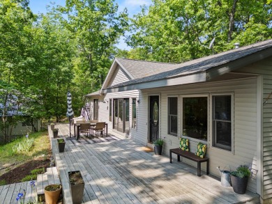 This beautiful Lake Mecosta property features 137 feet of nice on St. Ives Golf Club in Michigan - for sale on GolfHomes.com, golf home, golf lot