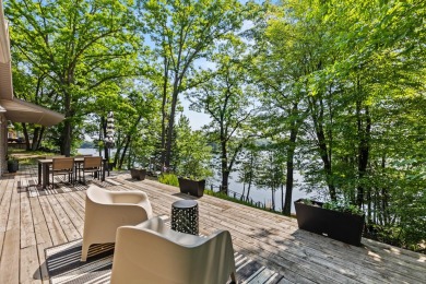 This beautiful Lake Mecosta property features 137 feet of nice on St. Ives Golf Club in Michigan - for sale on GolfHomes.com, golf home, golf lot