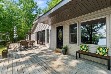 This beautiful Lake Mecosta property features 137 feet of nice on St. Ives Golf Club in Michigan - for sale on GolfHomes.com, golf home, golf lot