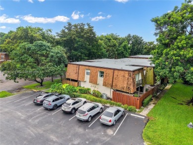 Discover this charming townhouse with 3 spacious bedrooms and 3 on Pine Island Ridge Country Club in Florida - for sale on GolfHomes.com, golf home, golf lot