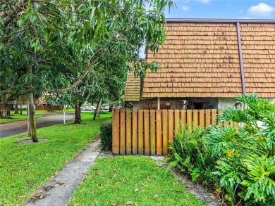 Discover this charming townhouse with 3 spacious bedrooms and 3 on Pine Island Ridge Country Club in Florida - for sale on GolfHomes.com, golf home, golf lot