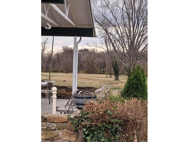 This split-foyer home sits on a desirable corner lot and on Brookside Golf Course in Virginia - for sale on GolfHomes.com, golf home, golf lot