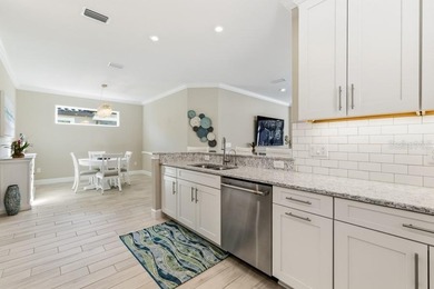 Live the resort lifestyle every day in this beautifully on Esplanade Golf and Country at Lakewood Ranch in Florida - for sale on GolfHomes.com, golf home, golf lot