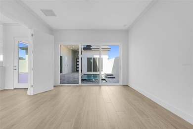 Beautiful 3 bed/3 bath one story courtyard home on an end lot - on Providence Golf Club in Florida - for sale on GolfHomes.com, golf home, golf lot