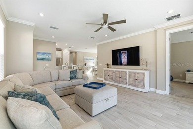 Live the resort lifestyle every day in this beautifully on Esplanade Golf and Country at Lakewood Ranch in Florida - for sale on GolfHomes.com, golf home, golf lot