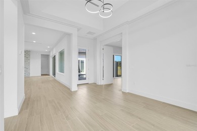 Beautiful 3 bed/3 bath one story courtyard home on an end lot - on Providence Golf Club in Florida - for sale on GolfHomes.com, golf home, golf lot