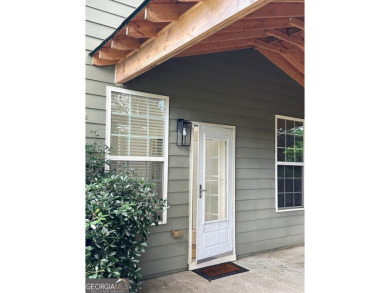 Welcome to this charming ranch-style home, situated on one of on Chateau Elan Golf Club  in Georgia - for sale on GolfHomes.com, golf home, golf lot