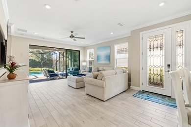 Live the resort lifestyle every day in this beautifully on Esplanade Golf and Country at Lakewood Ranch in Florida - for sale on GolfHomes.com, golf home, golf lot