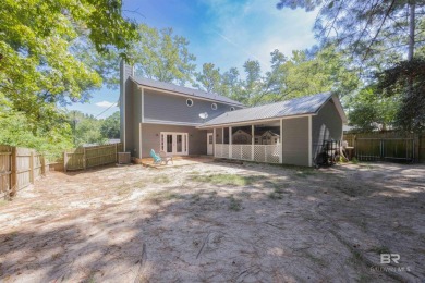New Orleans-style two-story home located on a quiet street in on Lake Forest Yacht and Country Club in Alabama - for sale on GolfHomes.com, golf home, golf lot