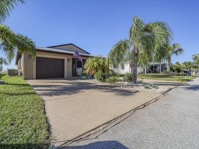 This stunning CBS home sits on a prime lot, offering serene on Spanish Lakes Fairways in Florida - for sale on GolfHomes.com, golf home, golf lot