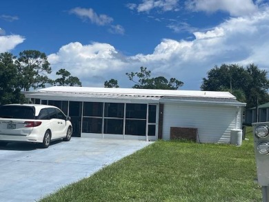 Lovely two-bedroom two bath home with lake views.  This home on Lake Fairways Country Club in Florida - for sale on GolfHomes.com, golf home, golf lot