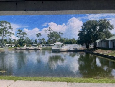 Lovely two-bedroom two bath home with lake views.  This home on Lake Fairways Country Club in Florida - for sale on GolfHomes.com, golf home, golf lot