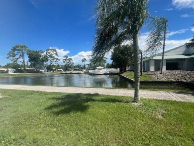 Lovely two-bedroom two bath home with lake views.  This home on Lake Fairways Country Club in Florida - for sale on GolfHomes.com, golf home, golf lot