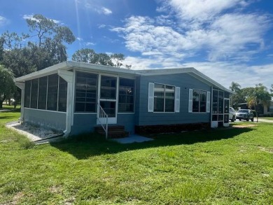 Lovely two-bedroom two bath home with lake views.  This home on Lake Fairways Country Club in Florida - for sale on GolfHomes.com, golf home, golf lot