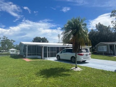 Lovely two-bedroom two bath home with lake views.  This home on Lake Fairways Country Club in Florida - for sale on GolfHomes.com, golf home, golf lot