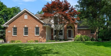 This terrific contemporary home gets a retreat like setting in on Whispering Pines Golf  in Michigan - for sale on GolfHomes.com, golf home, golf lot