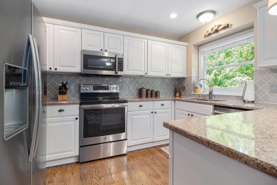 This terrific contemporary home gets a retreat like setting in on Whispering Pines Golf  in Michigan - for sale on GolfHomes.com, golf home, golf lot
