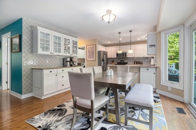 This terrific contemporary home gets a retreat like setting in on Whispering Pines Golf  in Michigan - for sale on GolfHomes.com, golf home, golf lot