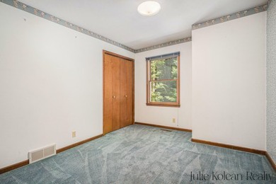 Don't miss this opportunity to own a well-maintained property on on Grand Haven Golf Club in Michigan - for sale on GolfHomes.com, golf home, golf lot