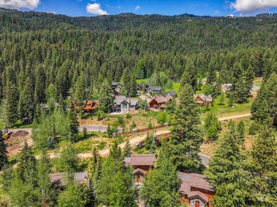 Your true ski-in/ski-out cabin awaits--nestled in the heart of on Osprey Meadows at Tamarack Resort in Idaho - for sale on GolfHomes.com, golf home, golf lot