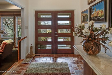 You enter this lovely home through its handsome double doors and on Tanasi Golf Course in Tennessee - for sale on GolfHomes.com, golf home, golf lot